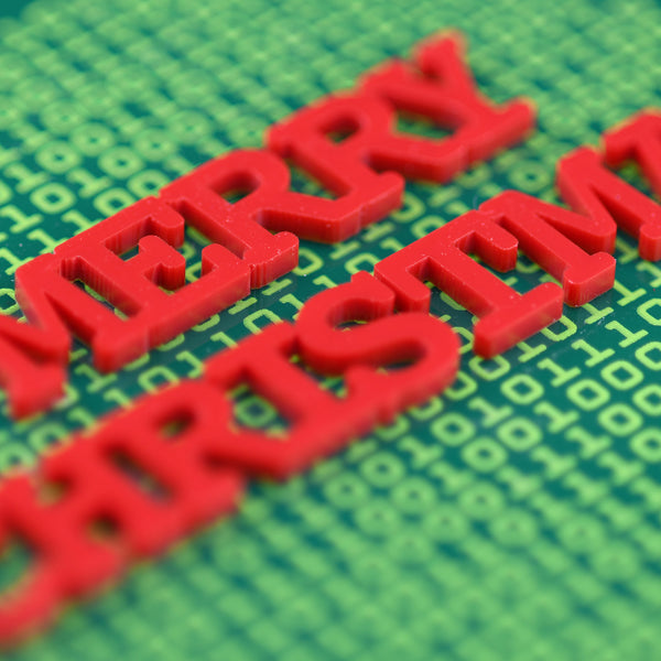Red text 'Merry Christmas' on a green digital background with binary code.