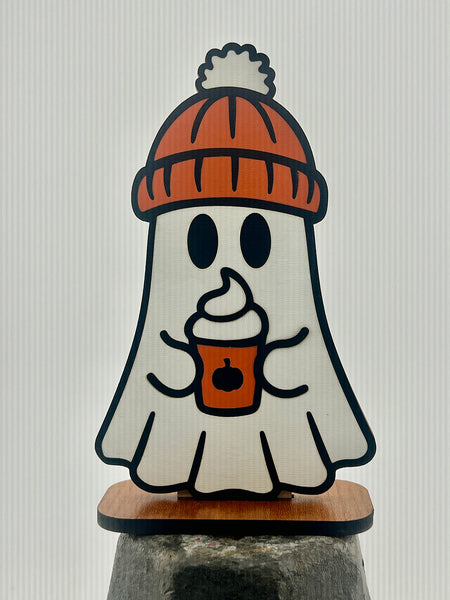 Ghost figurine with a beanie and pumpkin spice latte design on a white background