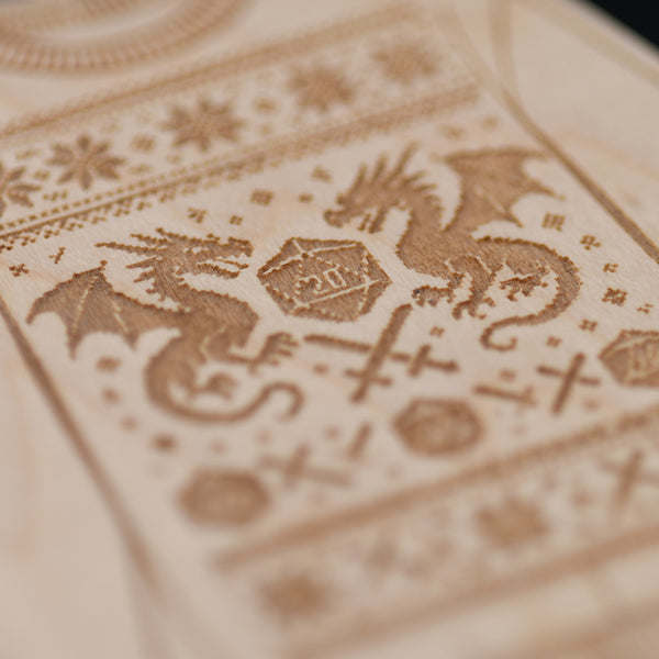 Close-up of a wooden surface with intricate carvings including dragons and geometric patterns.